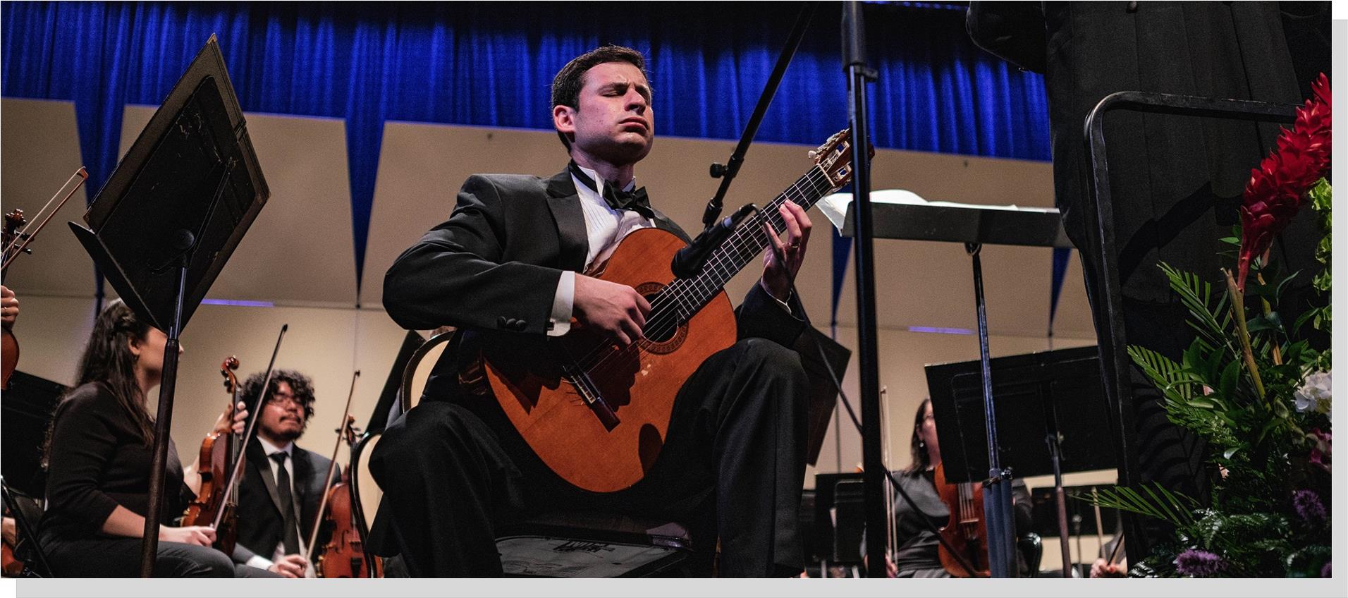 Matthew Trkula guitar performs with the NOVA Annandale Symphony Orchestra